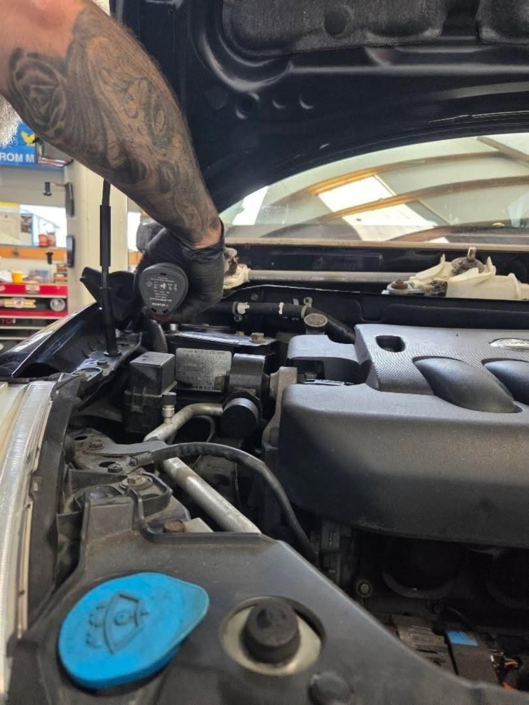 Mechanic working on engine